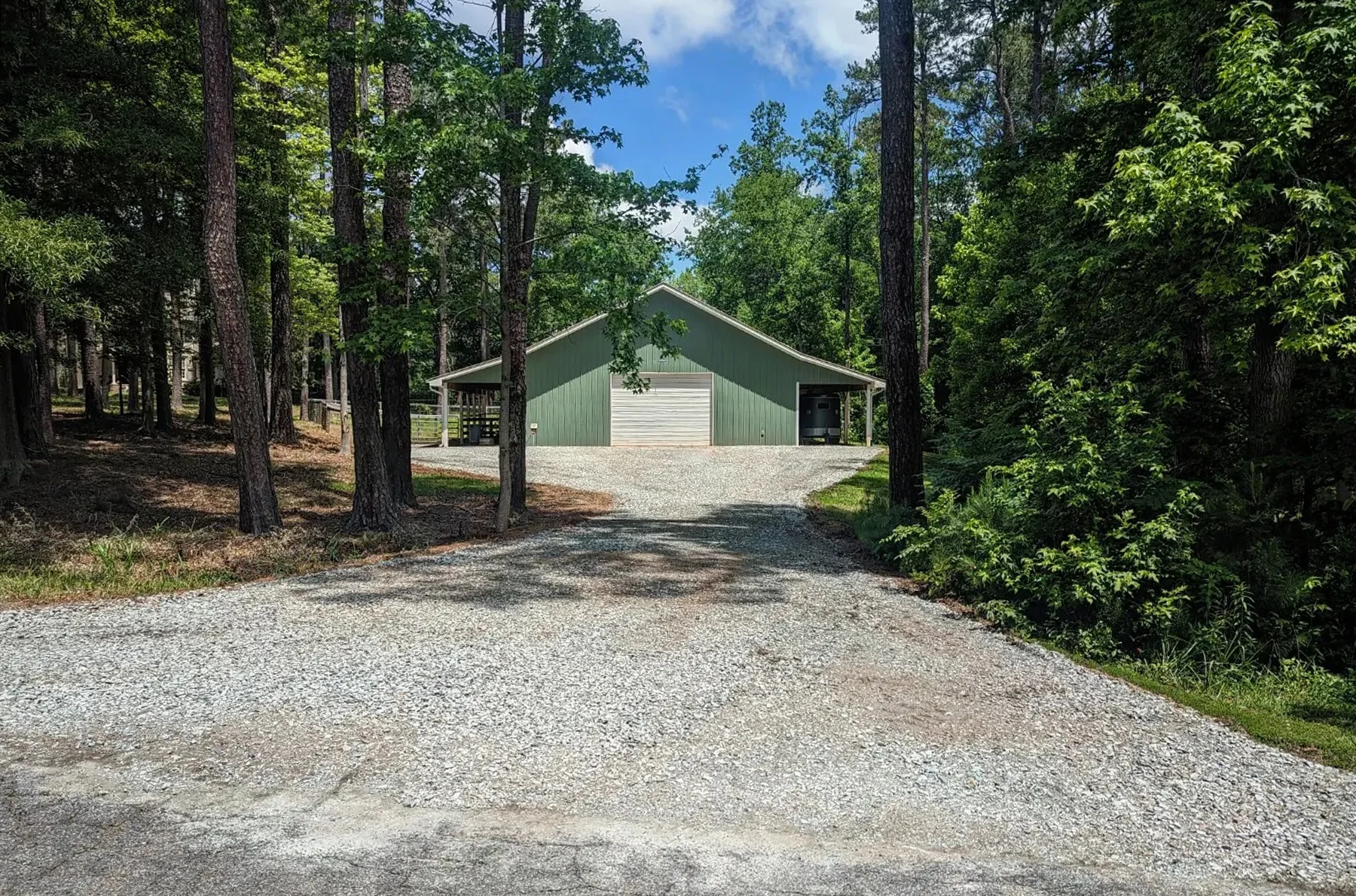 After gravel driveway repair — smooth, compacted surface